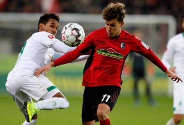 德甲排名保卫战:弗赖堡主场稳位,柏林联合同客场逆袭